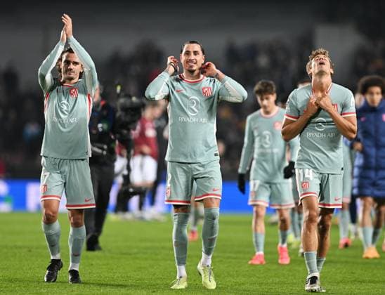 (L-R) Antoine Griezmann, Jose Maria Gimenez and Marcos Llorente of Atletico celebrate after winning the football Champions League 5th round match Sparta Praha vs Atletico Madrid in Prague, Czech Republic, November 26, 2024. (CTKxPhoto MichaelaxRihova) CTKPhotoP2024112607852  CTKPhotoP2024112607852
