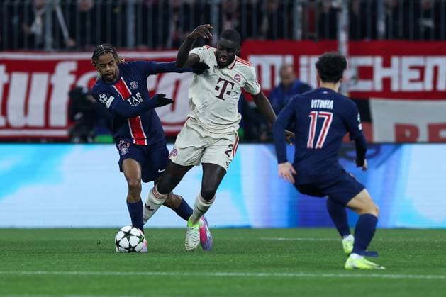 Soccer Champions League Matchday 5 FC Bayern Munich Paris Saint Germain on 26 11 2024 at the Allianz Arena in Munich Bradley Barcola Paris , left Dayot Upamecano Munich , right xMSx