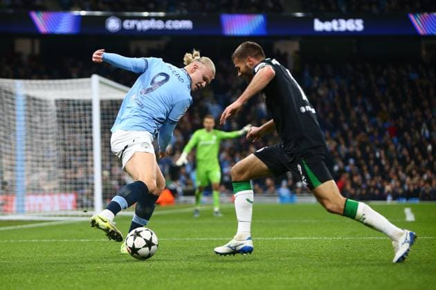 Erling Haaland of Manchester City and Baer Nieuwkoop of Feyenoord Manchester City v Feyenoord, UEFA Champions League, Group Stage, Football, Etihad Stadium, Manchester, UK - 26 Nov 2024 EDITORIAL USE ONLY No use with unauthorised audio, video, data, fixture lists, club league logos or live services. Online in-match use limited to 120 images, no video emulation. No use in betting, games or single club league player publications. Copyright: xPhilxOldham Shutterstockx 14940173j