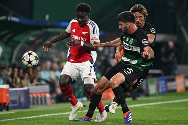 Bukayo Saka of Arsenal under pressure from Goncalo Inacio of Sporting CP Sporting Lisbon v Arsenal, UEFA Champions League, Group Stage, Football, Estadio Jose Alvalade, Lisbon, Portugal - 26 Nov 2024 EDITORIAL USE ONLY No use with unauthorised audio, video, data, fixture lists, club league logos or live services. Online in-match use limited to 120 images, no video emulation. No use in betting, games or single club league player publications. Copyright: xZedxJameson Shutterstockx 14940177ao