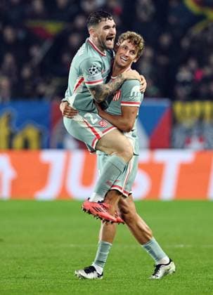Javi Galan, left, and Marcos Llorente of Atletico celebrate a goal during the football Champions League 5th round match Sparta Praha vs Atletico Madrid in Prague, Czech Republic, November 26, 2024. (CTKxPhoto MichaelaxRihova) CTKPhotoP2024112608009  CTKPhotoP2024112608009