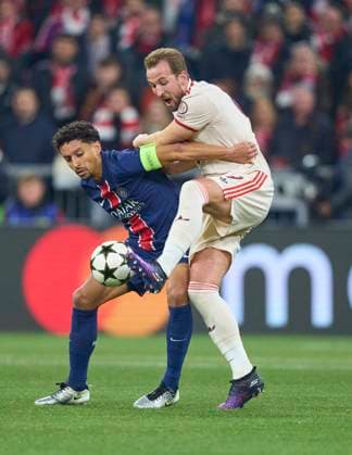 Harry Kane, FCB 9 compete for the ball, tackling, duel, header, zweikampf, action, fight against MARQUINHOS, PSG 5 in the League Phase MD5 match FC BAYERN MUENCHEN - PARIS SG of football UEFA Champions League in season 2024 2025 in Munich, Nov 26, 2024 , FCB, 5. Spieltag, München