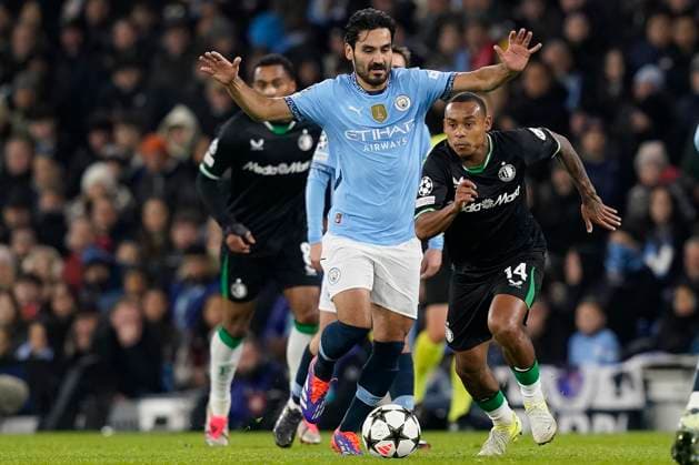Manchester, England, 26th November 2024. Igor Paixao of Feyenoord and Ä°lkay Gundogan of Manchester City challenge for the ball during the UEFA Champions League match at the Etihad Stadium, Manchester. Picture credit should read: Andrew Yates Sportimage EDITORIAL USE ONLY. No use with unauthorised audio, video, data, fixture lists, club league logos or live services. Online in-match use limited to 120 images, no video emulation. No use in betting, games or single club league player publications. SPI-3484-0024