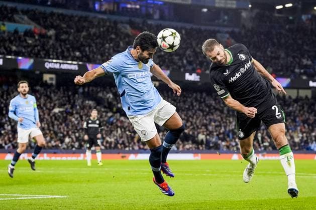 UEFA Champions League: Manchester City F.C. v Feyenoord Manchester - Ilkay Gundogan of Manchester City FC, Bart Nieuwkoop of Feyenoord during the fifth round of new format of the UEFA Champions League 2024 2025. The match is set between Manchester City and Feyenoord at Etihad Stadium on 26 November 2024 in Manchester, England. Copyright: xTomxBodex