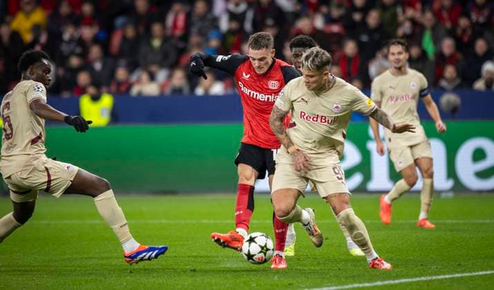 Leverkusen, Germany 26th Nov 2024 Goal for 3 0 by Florian Wirtz LEV against Kamil Piatkowski and Lucas Gourna Douath FCS Bayer Leverkusen FC Salzburg 26 11 2024