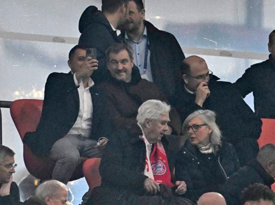26 11 2024, Football UEFA Championsleague 2024 2025 5 Matchday, FC Bayern Munich Paris St Germain, in the Allianz Arena Munich v l Bavarian Prime Minister Markus Söder Germany in the stands DFL and DFB regulations prohibit any use of photographs as image sequences and or quasi video