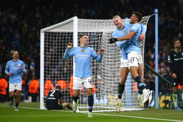 Erling Haaland of Manchester City celebrates scoring their sides third goal Manchester City v Feyenoord, UEFA Champions League, Group Stage, Football, Etihad Stadium, Manchester, UK - 26 Nov 2024 EDITORIAL USE ONLY No use with unauthorised audio, video, data, fixture lists, club league logos or live services. Online in-match use limited to 120 images, no video emulation. No use in betting, games or single club league player publications. Copyright: xPhilxOldham Shutterstockx 14940173aa