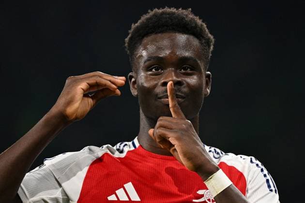 Bukayo Saka of Arsenal celebrates scoring a goal for their side to make it 4-0 Sporting Lisbon v Arsenal, UEFA Champions League, Group Stage, Football, Estadio Jose Alvalade, Lisbon, Portugal - 26 Nov 2024 EDITORIAL USE ONLY No use with unauthorised audio, video, data, fixture lists, club league logos or live services. Online in-match use limited to 120 images, no video emulation. No use in betting, games or single club league player publications. Copyright: xZedxJameson Shutterstockx 14940177dw