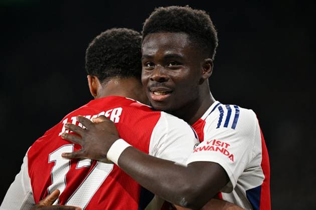 Bukayo Saka of Arsenal celebrates scoring the goal for their side with their teammates to make it 4-1 Sporting Lisbon v Arsenal, UEFA Champions League, Group Stage, Football, Estadio Jose Alvalade, Lisbon, Portugal - 26 Nov 2024 EDITORIAL USE ONLY No use with unauthorised audio, video, data, fixture lists, club league logos or live services. Online in-match use limited to 120 images, no video emulation. No use in betting, games or single club league player publications. Copyright: xZedxJameson Shutterstockx 14940177ee