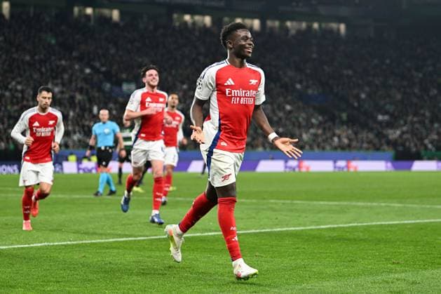 Bukayo Saka of Arsenal celebrates scoring a goal for their side to make it 4-1 Sporting Lisbon v Arsenal, UEFA Champions League, Group Stage, Football, Estadio Jose Alvalade, Lisbon, Portugal - 26 Nov 2024 EDITORIAL USE ONLY No use with unauthorised audio, video, data, fixture lists, club league logos or live services. Online in-match use limited to 120 images, no video emulation. No use in betting, games or single club league player publications. Copyright: xZedxJameson Shutterstockx 14940177ep