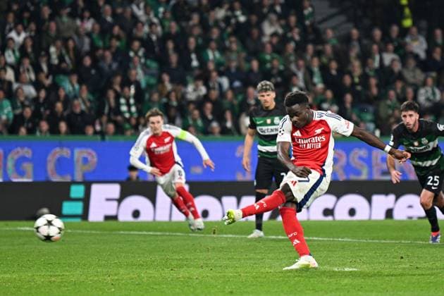 Bukayo Saka of Arsenal scores a goal for their side to make it 4-1 from the penalty spot Sporting Lisbon v Arsenal, UEFA Champions League, Group Stage, Football, Estadio Jose Alvalade, Lisbon, Portugal - 26 Nov 2024 EDITORIAL USE ONLY No use with unauthorised audio, video, data, fixture lists, club league logos or live services. Online in-match use limited to 120 images, no video emulation. No use in betting, games or single club league player publications. Copyright: xZedxJameson Shutterstockx 14940177ei