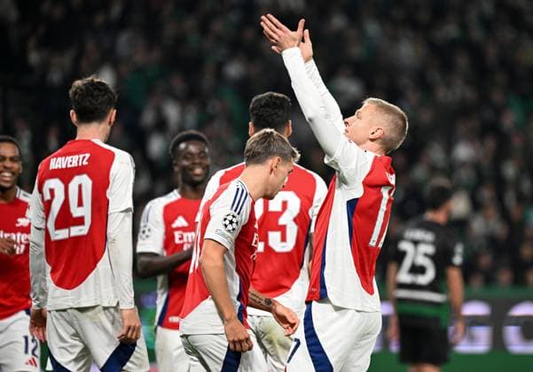 Gabriel Martinelli of Arsenal celebrates scoring the goal for their side with their teammates to make it 5-1 Sporting Lisbon v Arsenal, UEFA Champions League, Group Stage, Football, Estadio Jose Alvalade, Lisbon, Portugal - 26 Nov 2024 EDITORIAL USE ONLY No use with unauthorised audio, video, data, fixture lists, club league logos or live services. Online in-match use limited to 120 images, no video emulation. No use in betting, games or single club league player publications. Copyright: xZedxJameson Shutterstockx 14940177eu