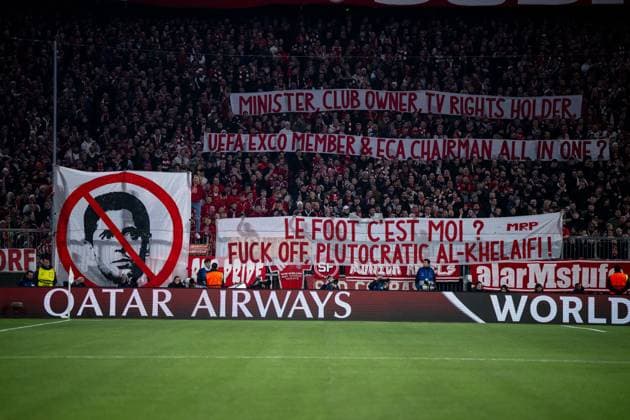 Ultras fans of the Suedkurve with banner to protest against PSG President Nasser Al Khelaifi, in front of it Qatar Airways advertising, GER, FC Bayern Muenchen FCB vs Paris Saint Germain PSG , Football, UEFA Champions League, Matchday 5, Season 2024 2025, 26 11 2024 GER, FC Bayern Muenchen FCB vs Paris Saint Germain PSG , Football, UEFA Champions League, Matchday 5, Season 2024 2025, 26 11 2024 Muenchen Copyright: xEibner-Pressefoto Memmlerx EP_MMR