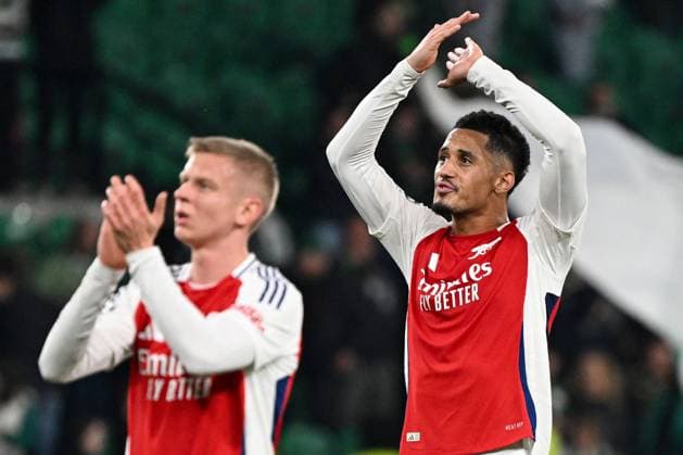 William Saliba of Arsenal (R) applauds the fans at full-time Sporting Lisbon v Arsenal, UEFA Champions League, Group Stage, Football, Estadio Jose Alvalade, Lisbon, Portugal - 26 Nov 2024 EDITORIAL USE ONLY No use with unauthorised audio, video, data, fixture lists, club league logos or live services. Online in-match use limited to 120 images, no video emulation. No use in betting, games or single club league player publications. Copyright: xZedxJameson Shutterstockx 14940177fs