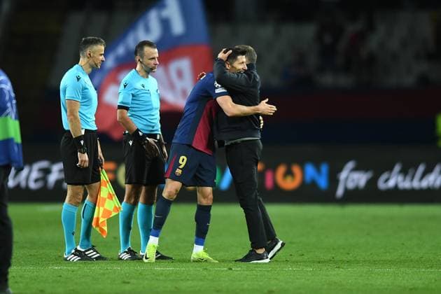 FC Barcelona, Barca v STADE BRESTOIS OLIMPIC STADIUM LLUIS COMPANYS. MONTJUIC,BARCELONA. NOVEMBER 26,2024 FC BARCELONA vs Stade Brestois November 26,2024 Robert Lewandowski (9) of FC Barcelona and Hansi Flick head coach of FC Barcelona at the end of the UEFA Champions League 2024 25 League Phase match between FC Barcelona and Stade Brestois at Olimpic Stadium Lluis Companys of MontjuÃ¯c in Barcelona, Spain. Barcelona ESP Copyright: xS.xRosx