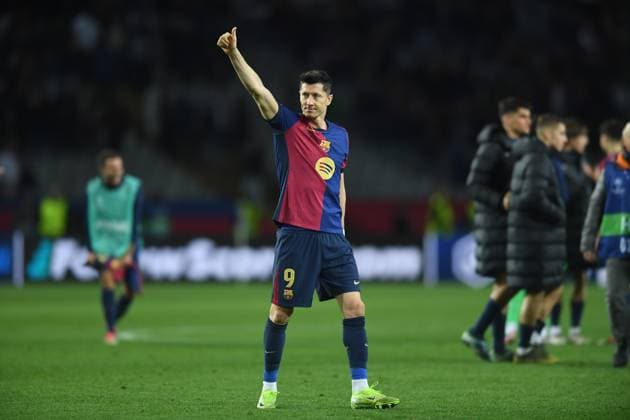 FC Barcelona, Barca v STADE BRESTOIS OLIMPIC STADIUM LLUIS COMPANYS. MONTJUIC,BARCELONA. NOVEMBER 26,2024 FC BARCELONA vs Stade Brestois November 26,2024 Robert Lewandowski (9) of FC Barcelona and Hansi Flick head coach of FC Barcelona at the end of the UEFA Champions League 2024 25 League Phase match between FC Barcelona and Stade Brestois at Olimpic Stadium Lluis Companys of MontjuÃ¯c in Barcelona, Spain. Barcelona ESP Copyright: xS.xRosx