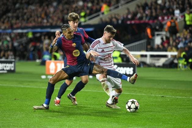 FC Barcelona, Barca v STADE BRESTOIS OLIMPIC STADIUM LLUIS COMPANYS. MONTJUIC,BARCELONA. NOVEMBER 26,2024 FC BARCELONA vs Stade Brestois November 26,2024 Raphina (11) of FC Barcelona vies with Hugo Magnetti (8) of Stade Brestois during the UEFA Champions League 2024 25 League Phase match between FC Barcelona and Stade Brestois at Olimpic Stadium Lluis Companys of MontjuÃ¯c in Barcelona, Spain. Barcelona ESP Copyright: xS.xRosx