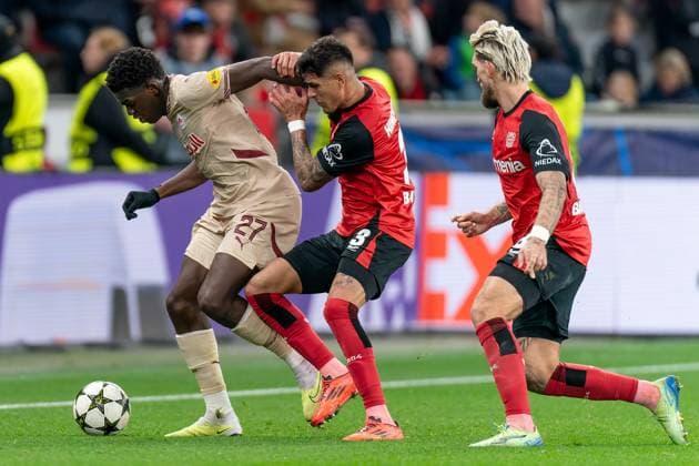 2024-11-26 Bayer 04 Leverkusen v FC Salzburg - UEFA Champions League 2024 25 League Phase MD5 LEVERKUSEN, GERMANY - NOVEMBER 26: Lucas Gourna-Douath of FC Salzburg battles for the ball with Piero Hincapie of Bayer 04 Leverkusen during the UEFA Champions League 2024 25 League Phase MD5 match between Bayer 04 Leverkusen and FC Salzburg at BayArena on November 26, 2024 in Leverkusen, Germany. (Photo by Joris Verwijst BSR Agency) Leverkusen Germany Content not available for redistribution in The Netherlands directly or indirectly through any third parties. Copyright: xBSRxAgencyx