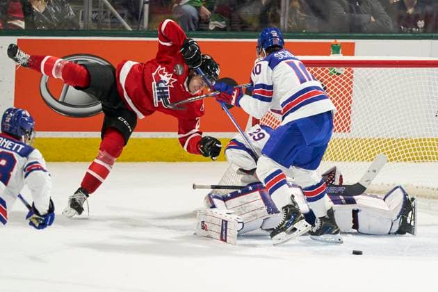 November 26, 2024, London, On, Canada: CHL prospect Cole Reschny, left, is checked by USA prospect Drew Schock IV during the first period of the CHL-USA Prospects Challenge game in London, Ont. on Tuesday, November 26, 2024. Canada News - November 26, 2024  - ZUMAc35_ 20241126_zaf_c35_099 Copyright: xGeoffxRobinsx