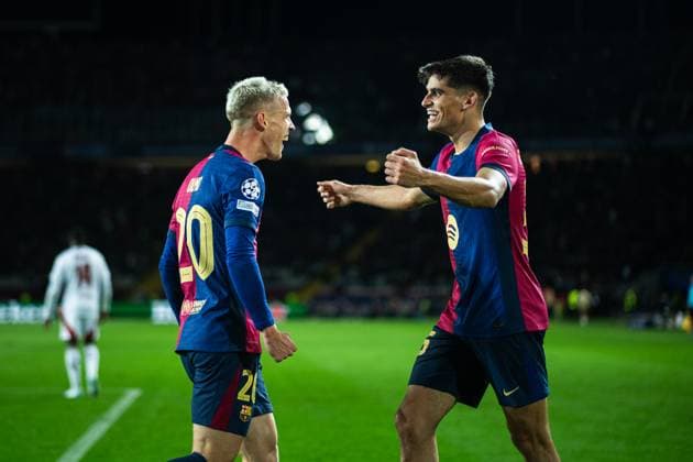 (241127) -- BARCELONA, Nov. 27, 2024 -- Dani Olmo (L) of Barcelona celebrates with Gerard Martin after scoring during the league phase match between FC Barcelona, Barca and Stade Brestois at the UEFA Champions League in Barcelona, Spain, on Nov. 26, 2024. (Photo by Xinhua) (SP)SPAIN-BARCELONA-FOOTBALL-CHAMPIONS LEAGUE-FC BARCELONA VS STADE BRESTOIS JoanxGosa 