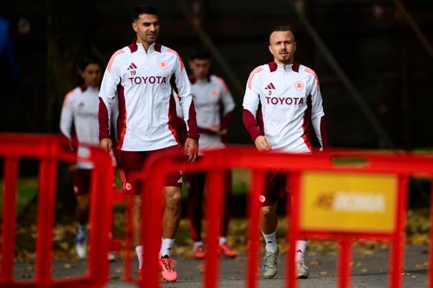 Mehmet Zeki Celik and Jose Angel Esmoris Tasende Angelino of AS Roma arrive for a training session the day before the Europa League football match between Tottenham and AS Roma at Centro Sportivo Fulvio Bernardini in Rome (Italy), November 27, 2024. AndreaxStaccioli