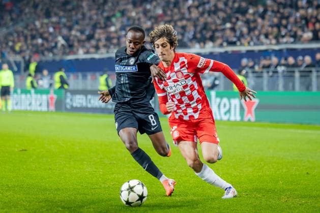 SOCCER - UEFA CL, Sturm vs Girona KLAGENFURT,AUSTRIA,27.NOV.24 - SOCCER - UEFA Champions League, SK Sturm Graz vs Girona FC. Image shows Malick Yalcouye (Sturm) and Bryan Gil (Girona).  GEPAxpictures xMatthiasxTrinkl