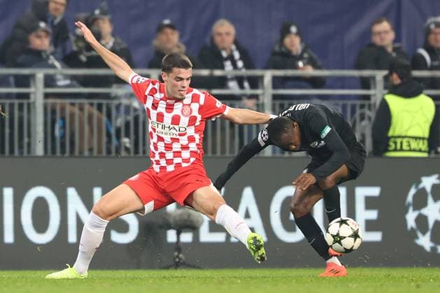 SOCCER - UEFA CL, Sturm vs Girona KLAGENFURT,AUSTRIA,27.NOV.24 - SOCCER - UEFA Champions League, SK Sturm Graz vs Girona FC. Image shows Miguel Gutierrez (Girona) and Malick Yalcouye (Sturm).  GEPAxpictures xChrisxBauer