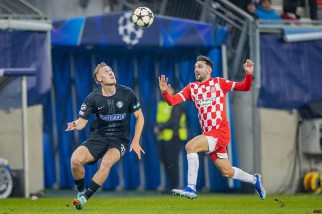 SOCCER - UEFA CL, Sturm vs Girona KLAGENFURT,AUSTRIA,27.NOV.24 - SOCCER - UEFA Champions League, SK Sturm Graz vs Girona FC. Image shows Niklas Geyrhofer (Sturm) and Ivan Martin (Girona).  GEPAxpictures xMatthiasxTrinkl