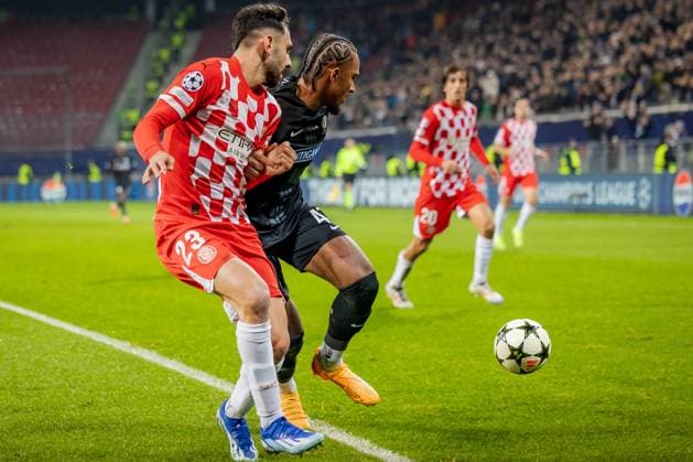 SOCCER - UEFA CL, Sturm vs Girona KLAGENFURT,AUSTRIA,27.NOV.24 - SOCCER - UEFA Champions League, SK Sturm Graz vs Girona FC. Image shows Ivan Martin (Girona) and Emanuel Aiwu (Sturm).  GEPAxpictures xMatthiasxTrinkl