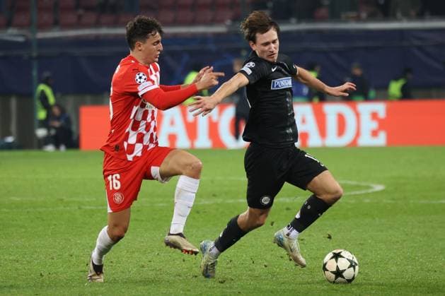 SOCCER - UEFA CL, Sturm vs Girona KLAGENFURT,AUSTRIA,27.NOV.24 - SOCCER - UEFA Champions League, SK Sturm Graz vs Girona FC. Image shows Alejandro Frances (Girona) and William Boeving (Sturm).  GEPAxpictures xChrisxBauer