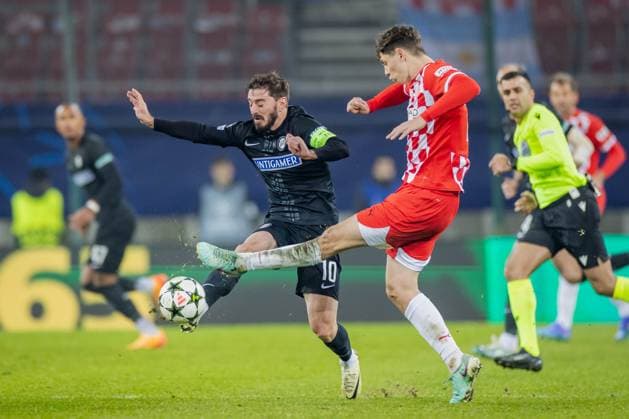 SOCCER - UEFA CL, Sturm vs Girona KLAGENFURT,AUSTRIA,27.NOV.24 - SOCCER - UEFA Champions League, SK Sturm Graz vs Girona FC. Image shows Otar Kiteishvili (Sturm) and Arnau Martinez (Girona).  GEPAxpictures xMatthiasxTrinkl