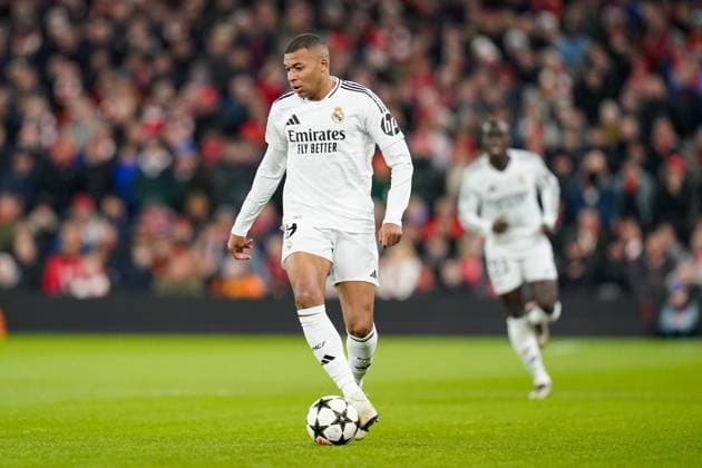 Liverpool FC v Real Madrid CF Real Madrid forward Kylian Mbappe (9) in action during the Liverpool FC v Real Madrid CF UEFA Champions League Round 1 league phase Matchday 5 at Anfield, Liverpool, England, United Kingdom on 27 November 2024 Editorial use only. All images are copyright Every Second Media Limited. No images may be reproduced without prior permission. Copyright: xIMAGO EveryxSecondxMediax ESM-1227-0035