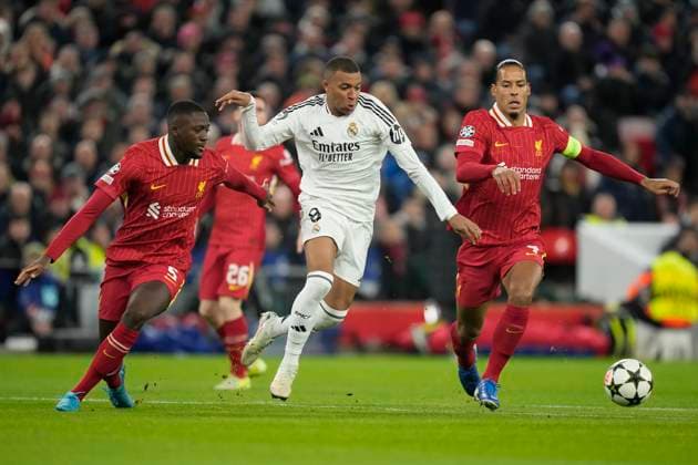 Liverpool FC v Real Madrid C.F. - UEFA Champions League 2024 25 League Phase MD5 Kylian Mbappe centre-forward of Real Madrid and France and Virgil van Dijk centre-back of Liverpool and Netherlands during the UEFA Champions League 2024 25 League Phase MD5 match between Liverpool FC and Real Madrid C.F. at Anfield on November 27, 2024 in Liverpool, England. Liverpool England United Kingdom  Copyright: xJosexBretonx originalFilename:bretonhernandez-liverpoo241127_npdhR.jpg