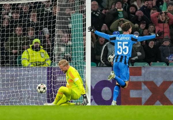 Maxim De Cuyper of Club Brugge celebrates as Cameron Carter-Vickers of Celtic scores an own goal past Celtic goalkeeper Kasper Schmeichel to give Club Brugge a 0-1 lead. Celtic v Club Brugge, UEFA Champions League, Group Stage, Football, Celtic Park, Glasgow, Scotland, UK - 27 Nov 2024 EDITORIAL USE ONLY No use with unauthorised audio, video, data, fixture lists, club league logos or live services. Online in-match use limited to 120 images, no video emulation. No use in betting, games or single club league player publications. Copyright: xStuartxWallace Shutterstockx 14945035aw
