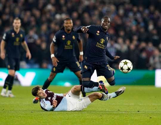 Birmingham, England, 27th November 2024. Aston Villa s Pau Torres fouls Juventus Timothy Weah during the UEFA Champions League match at Villa Park, Birmingham. Picture credit should read: Andrew Yates Sportimage EDITORIAL USE ONLY. No use with unauthorised audio, video, data, fixture lists, club league logos or live services. Online in-match use limited to 120 images, no video emulation. No use in betting, games or single club league player publications. SPI-3485-0020
