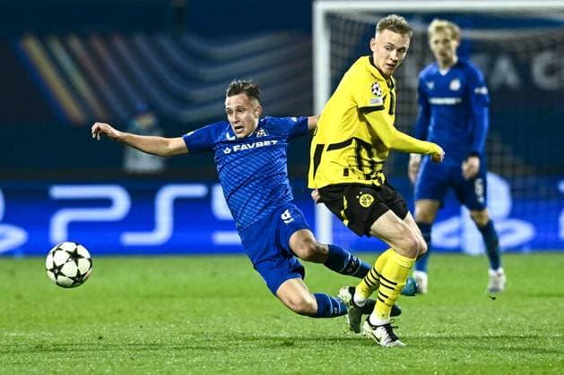 GNK Dinamo v Borussia Dortmund - UEFA Champions League 2024 25 League Phase MD5 Lukas Kacavenda of Dinamo Zagreb is challenged by Maximilian Beier of Borussia Dortmund during the UEFA Champions League 2024 25 League Phase MD5 match between GNK Dinamo Zagreb and Borussia Dortmund at Maksimir stadium on November 27, 2024 in Zagreb, Croatia.  MarkoxLukunic PIXSELL