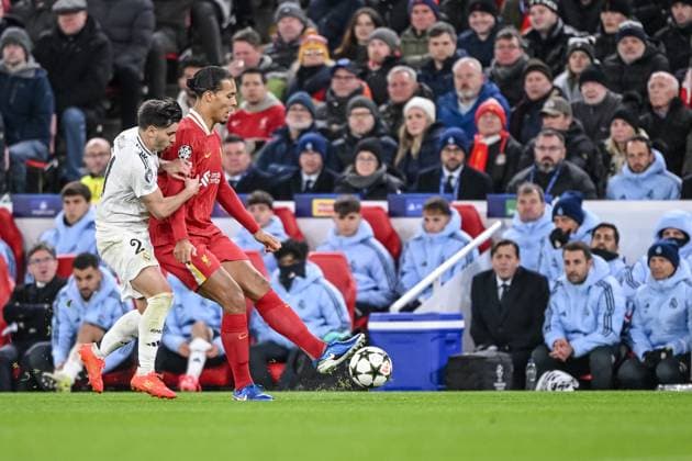 Brahim Diaz Real Madrid CF and Virgil van Dijk Liverpool FC battle for the ball during the UEFA Champions League 2024 25 League Phase MD5 match between Liverpool FC and Real Madrid C F at Anfield on November 27, 2024 in Liverpool, England Defodi 541 LIVREA20241127 028 Defodi-541