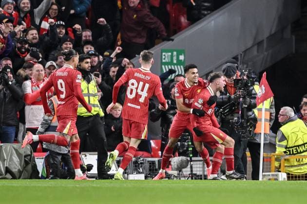Alexis Mac Allister Liverpool FC celebrates after scoring his team s first goal with teammates during the UEFA Champions League 2024 25 League Phase MD5 match between Liverpool FC and Real Madrid C F at Anfield on November 27, 2024 in Liverpool, England Defodi 541 LIVREA20241127 031 Defodi-541