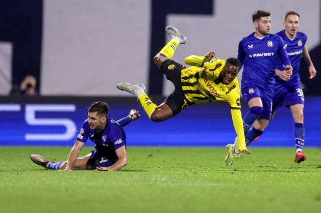 GNK Dinamo v Borussia Dortmund - UEFA Champions League 2024 25 League Phase MD5 Raul Torrente of Dinamo Zagreb makes a foul on Jamie Gittens of Borussia Dortmund during the UEFA Champions League 2024 25 League Phase MD5 match between GNK Dinamo Zagreb and Borussia Dortmund at Maksimir stadium on November 27, 2024 in Zagreb, Croatia.  LukaxStanzl PIXSELL