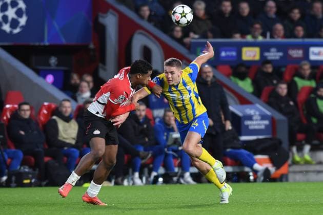 Soccer UEFA Champions League matchday 5 PSV Eindhoven Shakhtar Donetsk on 27 11 2024 at Philips Stadion in Eindhoven Malik Tillmann Eindhoven , left Danylo Sikan Donetsk , right xRx