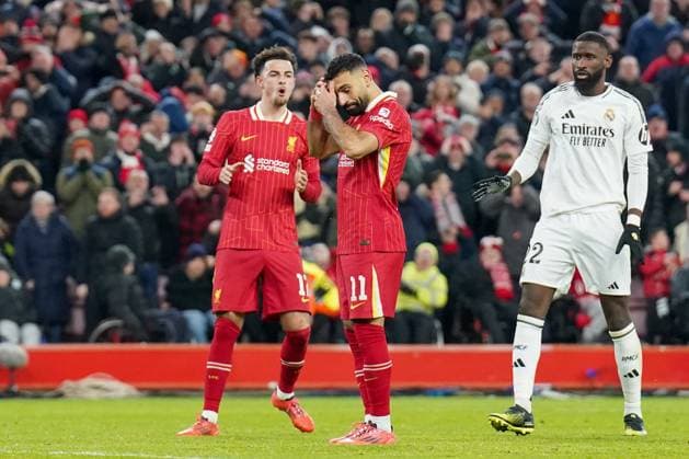 Liverpool FC v Real Madrid CF Liverpool forward Mohamed Salah (11) reacts after penalty kick miss during the Liverpool FC v Real Madrid CF UEFA Champions League Round 1 league phase Matchday 5 at Anfield, Liverpool, England, United Kingdom on 27 November 2024 Editorial use only. All images are copyright Every Second Media Limited. No images may be reproduced without prior permission. Copyright: xIMAGO EveryxSecondxMediax ESM-1227-0063