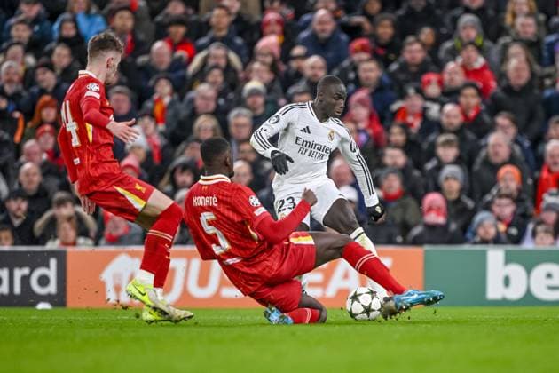 Conor Bradley Liverpool FC , Ibrahima Konate Liverpool FC and Ferland Mendy Real Madrid CF battle for the ball during the UEFA Champions League 2024 25 League Phase MD5 match between Liverpool FC and Real Madrid C F at Anfield on November 27, 2024 in Liverpool, England Defodi 541 LIVREA20241127 044 Defodi-541