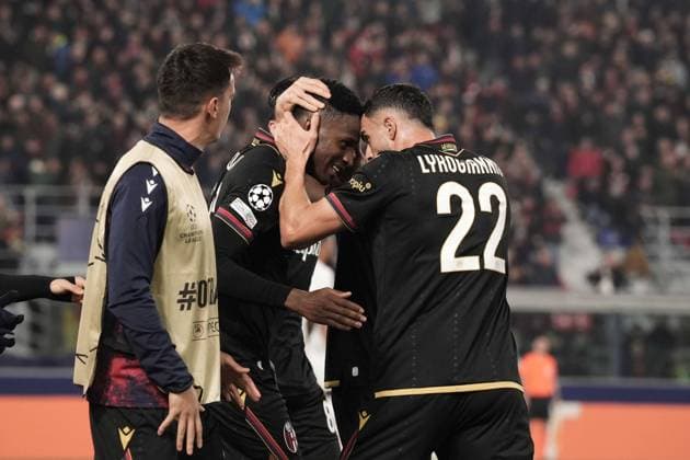 Bologna s Jhon Lucumi celebrates with Bologna s Charalampos Lykogiannis after scoring the 1-1 goal for his team during the Uefa Champions League 2024 2025 soccer match between Bologna and Lille at Renato Dall Ara Stadium - Soccer - Bologna, Italy - Wednesday November 27, 2024  Copyright: xMassimoxPaolone LaPressex