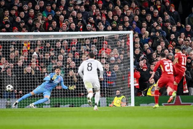 Goalkeeper Thibaut Courtois Real Madrid CF and Mohamed Salah Liverpool FC battle for the ball during the UEFA Champions League 2024 25 League Phase MD5 match between Liverpool FC and Real Madrid C F at Anfield on November 27, 2024 in Liverpool, England Defodi 541 LIVREA20241127 047 Defodi-541