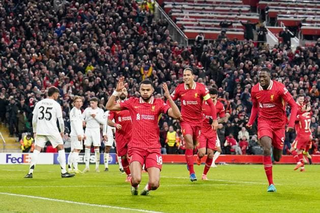 Liverpool FC v Real Madrid CF Liverpool forward Cody Gakpo (18) scores a GOAL 2-0 and celebrates with Liverpool defender Virgil van Dijk (4) and Liverpool defender Ibrahima Konate (5) during the Liverpool FC v Real Madrid CF UEFA Champions League Round 1 league phase Matchday 5 at Anfield, Liverpool, England, United Kingdom on 27 November 2024 Editorial use only. All images are copyright Every Second Media Limited. No images may be reproduced without prior permission. Copyright: xIMAGO EveryxSecondxMediax ESM-1227-0075
