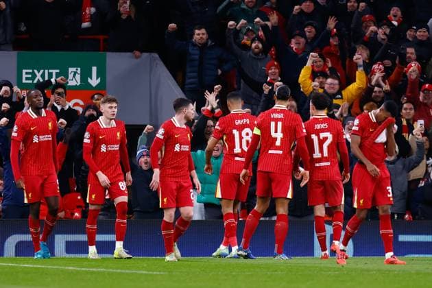 November 27, 2024, Liverpool, Liverpool, ENGLAND: Cody Gakpo of Liverpool celebrates a goal with teammates during the UEFA Champions League 2024 25 League Phase MD5 match between Liverpool FC and Real Madrid CF at Anfield on November 27, 2024, in Liverpool, England. Liverpool ENGLAND - ZUMAa181 20241127_zaa_a181_070 Copyright: xDennisxAgyemanx