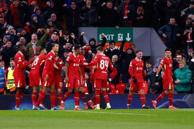 November 27, 2024, Liverpool, Liverpool, ENGLAND: Cody Gakpo of Liverpool celebrates a goal with teammates during the UEFA Champions League 2024 25 League Phase MD5 match between Liverpool FC and Real Madrid CF at Anfield on November 27, 2024, in Liverpool, England. Liverpool ENGLAND - ZUMAa181 20241127_zaa_a181_069 Copyright: xDennisxAgyemanx