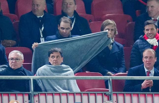 Rafa Nadal under a blanket Liverpool v Real Madrid, UEFA Champions League, Group Stage, Football, Anfield, Liverpool, UK - 27 Nov 2024 EDITORIAL USE ONLY No use with unauthorised audio, video, data, fixture lists, club league logos or live services. Online in-match use limited to 120 images, no video emulation. No use in betting, games or single club league player publications. Copyright: xJavierxGarcia Shutterstockx 14945029be
