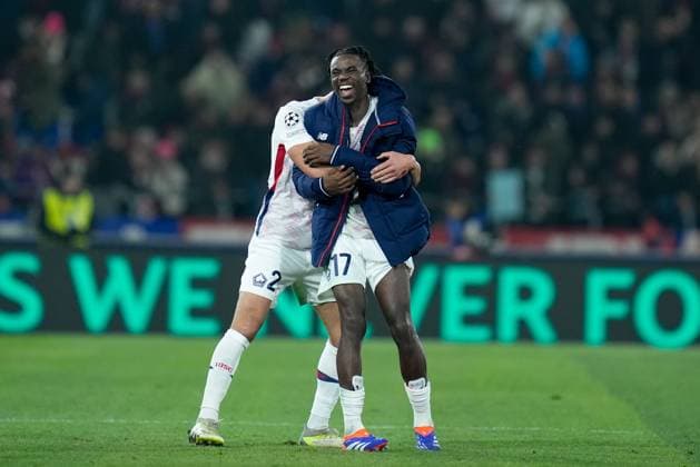 Bologna FC v LOSC Lille - UEFA Champions League 2024 25 Ngal™ayel Mukau of LOSC Lille celebrates. the victory with Aissa Mandi of LOSC Lille during the UEFA Champions League 2024 25 League Phase MD5 match between Bologna FC and LOSC Lille at Stadio Renato Dall™Ara on November 27, 2024 in Bologna, Italy. Bologna Stadio Renato Dall ARA Bologna Italy Copyright: xGiuseppexMaffiax UCL_BOLOGNA_LILLE_271124_BRU3296