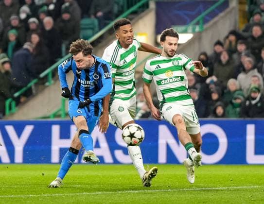 Maxim De Cuyper of Club Brugge shoots at goal under pressure from Auston Trusty & Nicolas Kuhn of Celtic. Celtic v Club Brugge, UEFA Champions League, Group Stage, Football, Celtic Park, Glasgow, Scotland, UK - 27 Nov 2024 EDITORIAL USE ONLY No use with unauthorised audio, video, data, fixture lists, club league logos or live services. Online in-match use limited to 120 images, no video emulation. No use in betting, games or single club league player publications. Copyright: xStuartxWallace Shutterstockx 14945035cq